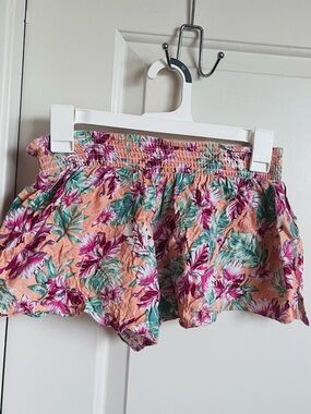 Lagaci Peach Floral High-Waisted Smocked Women’s Shorts